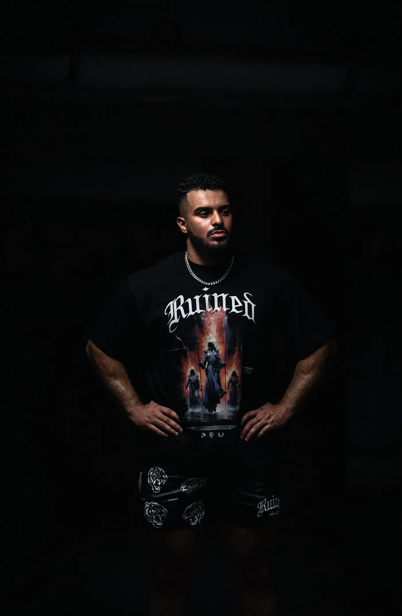 Dark portrait against a black ground